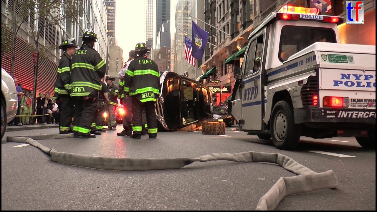 **MANHATTAN CRASH** FDNY & NYPD ESU Overturned Car, West 44th St., 10/16/2014.