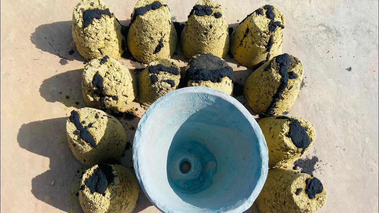 Yellow dirt crumbling in pot dusty crispy crunchy texture crumbling 