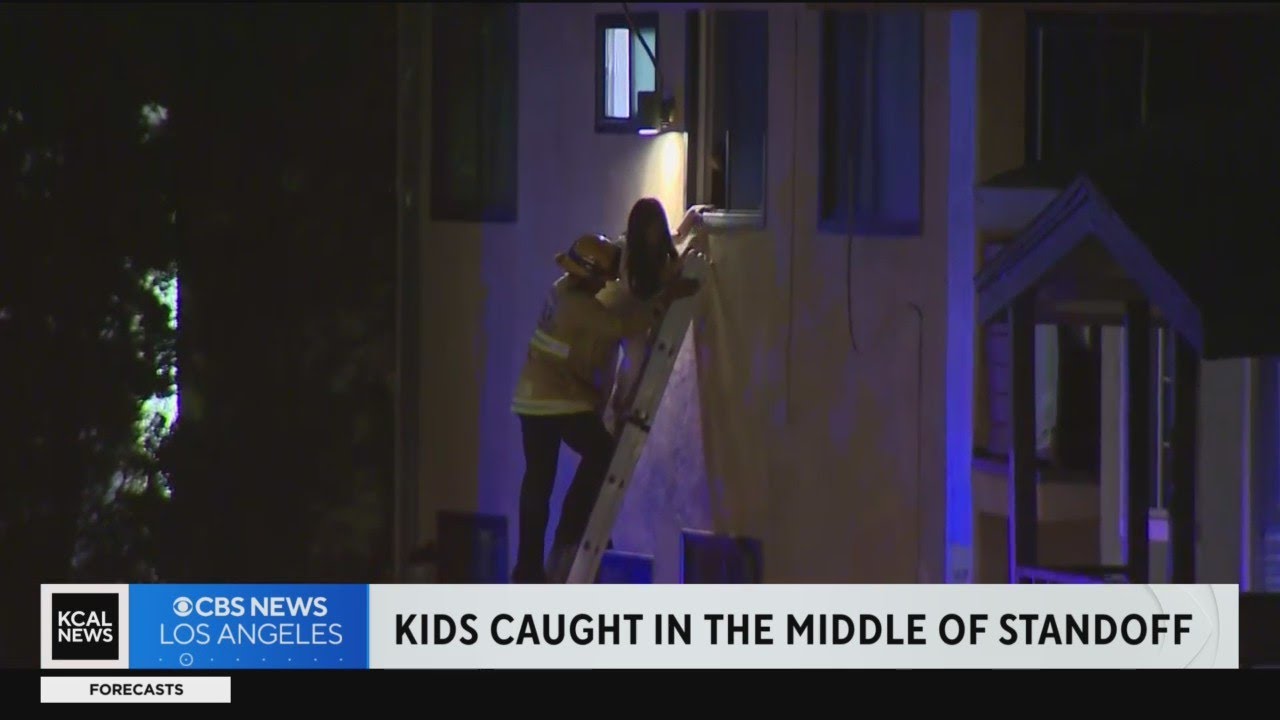 Neighbors describe standoff after an armed robbery suspect bursts into Long Beach apartment