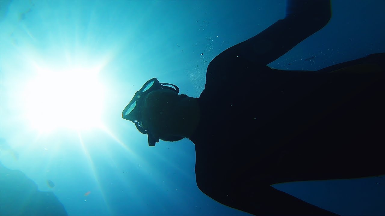 Freediving in Bright Blue Crystal Clear Water with Jellyfish Achill Island Ireland