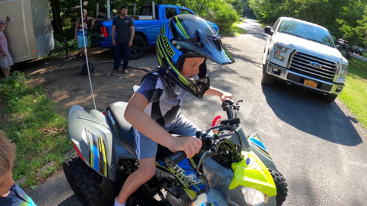 A Polaris Outlaw 110 for my brother and I
