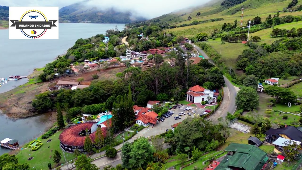 VOLANDO EN DRONE 4K - LAGO CALIMA