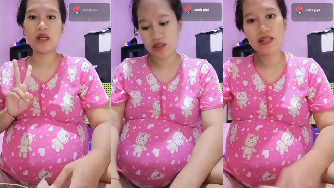 Bunda hamil sudah 8bulan duduk santai di tempat tidur