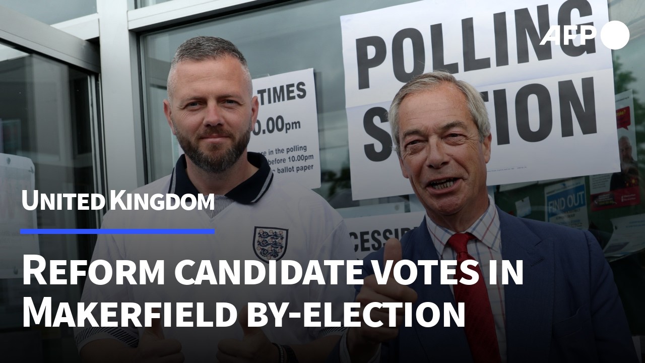 Reform candidate in crunch UK by-election casts vote alongside Farage | AFP