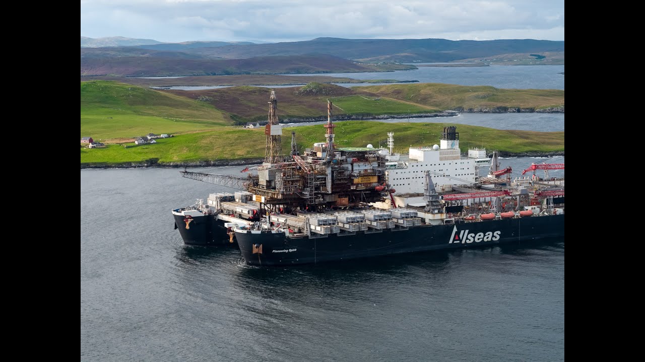Pioneering Spirit first in-port topside transfer at Dales Voe, Lerwick Harbour from Ninian field.