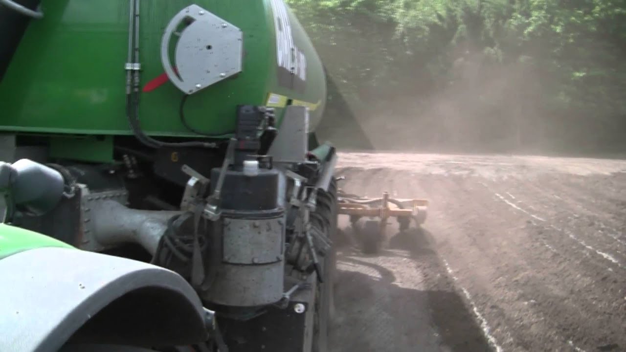 Peecon Cargo 24500 tank pulled by John Deere 8330