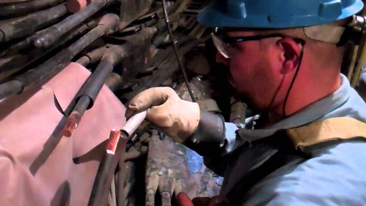 Con Edison Crew Repair Electrical Equipment in NYC Manhole