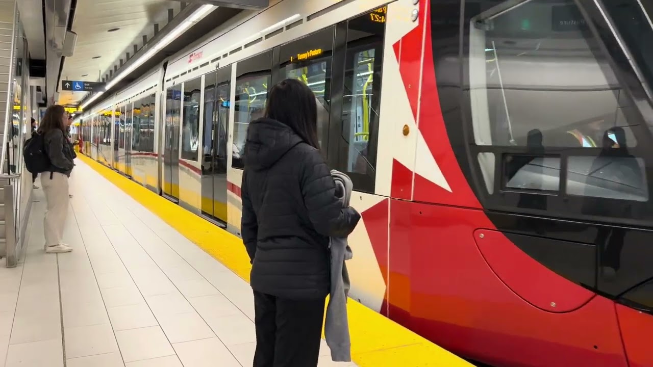 OTTAWA LIGHT METRO TRAINS IN ACTION AT LYON STATION