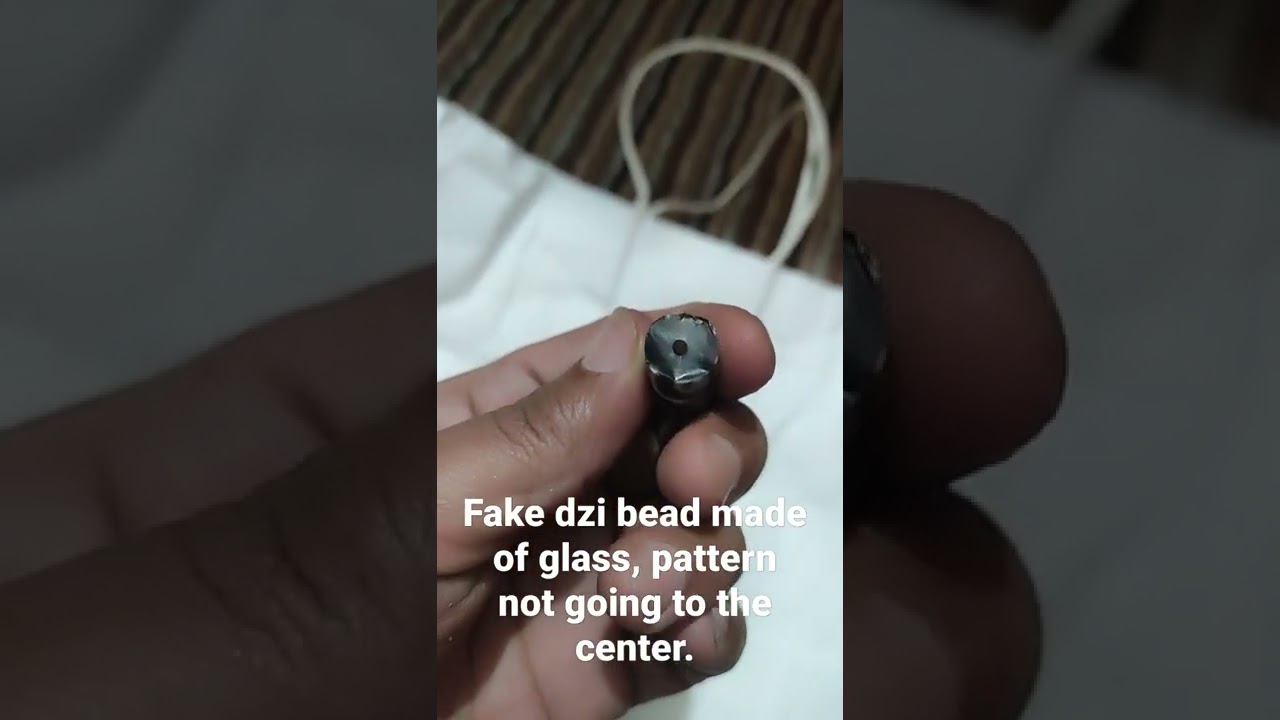 fake dzi bead made of glass. #fake#dzi#beads#ancient#agate#etched#tibetan#