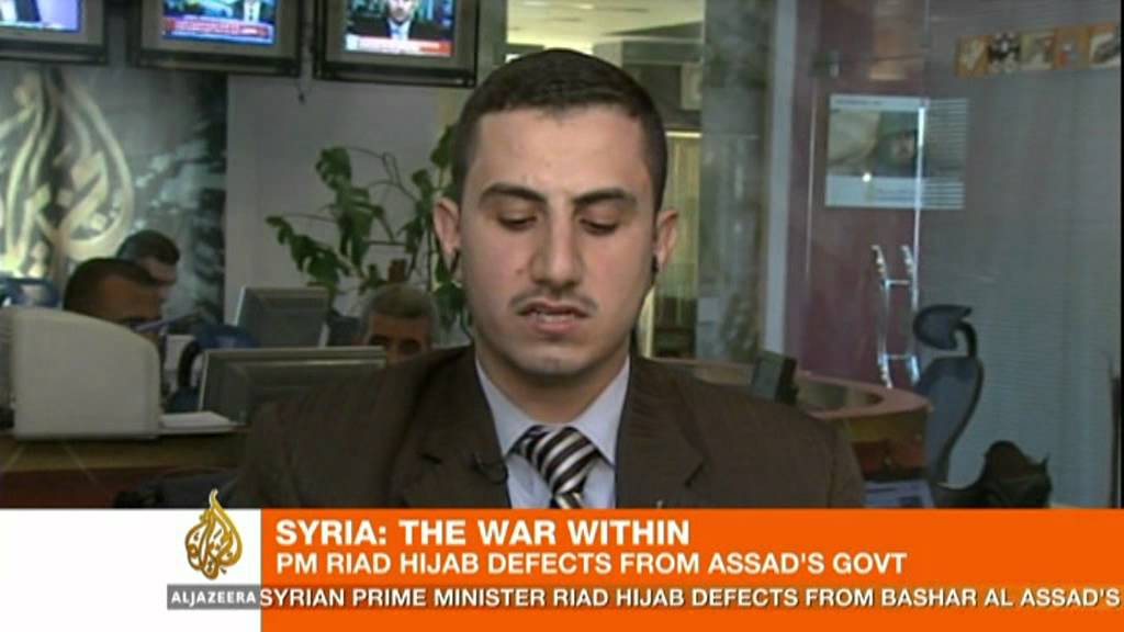 Syria's PM abandons Assad government