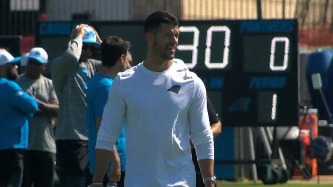 Temperatures, tensions ramp up at Panthers training camp