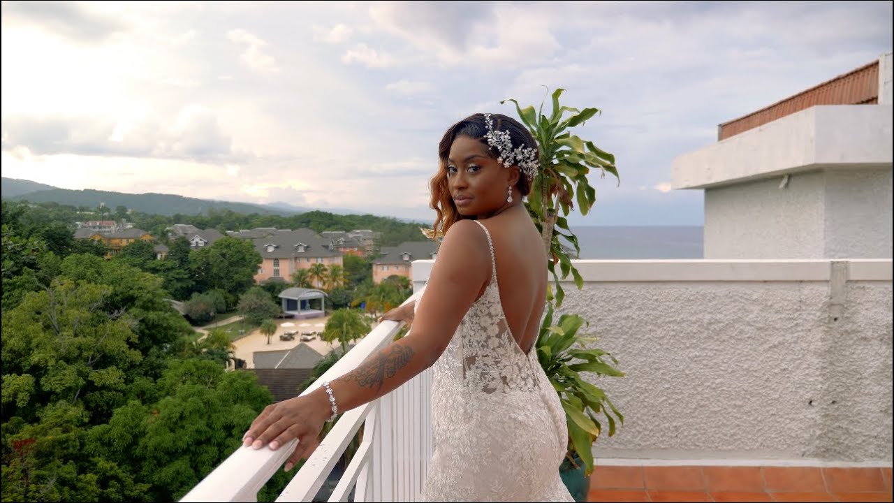 Destination Wedding shot in Ocho Rios, Jamaica. Sandals Resort with amazing blue water.