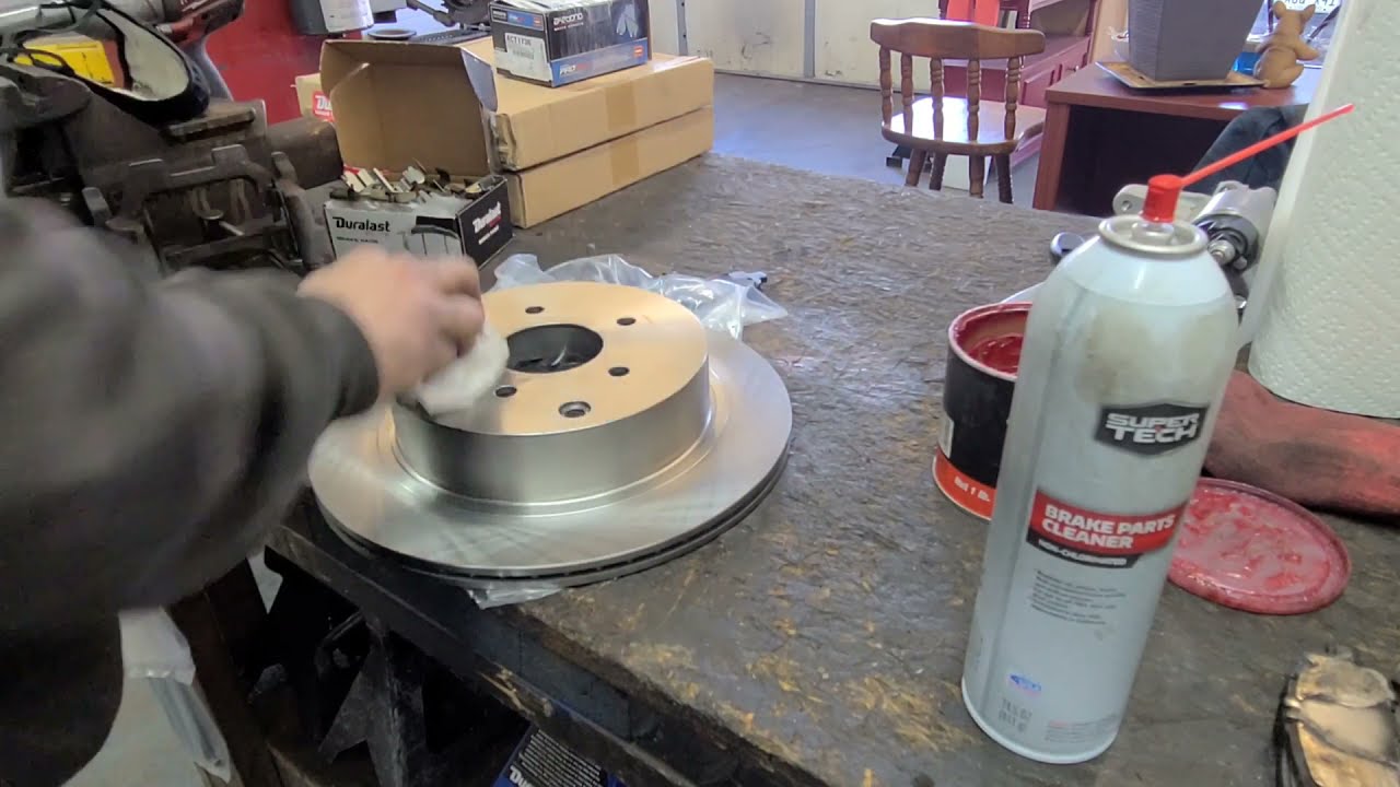Front and Rear Brake Pads & Rotors on a 2015 Infinity Q50