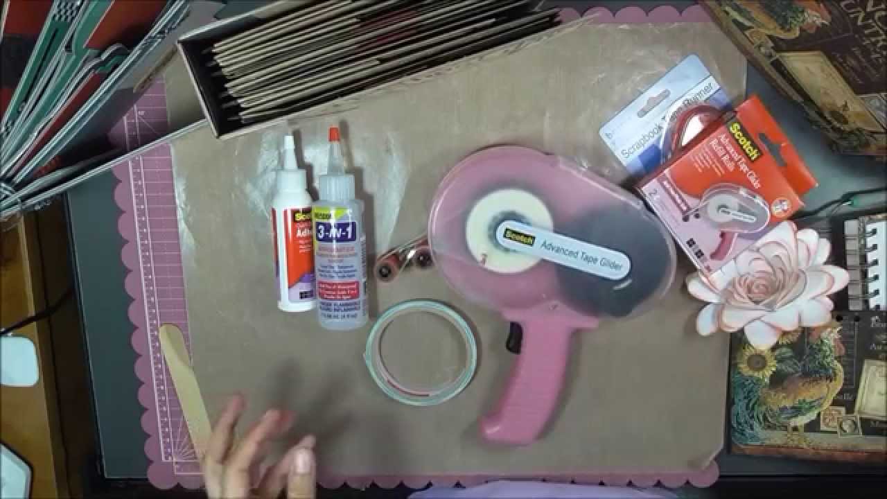 What type of glue should I use to make a scrapbook / mini album?