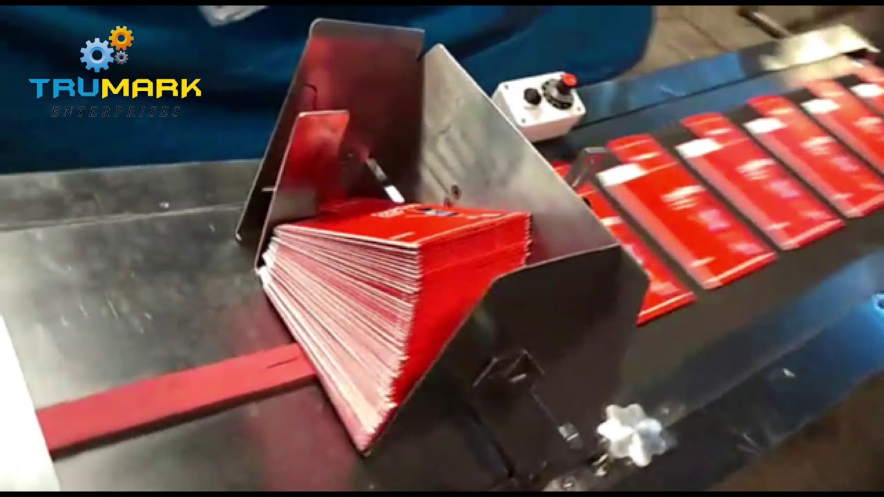Friction feeder for cartons-Inkjet printer conveyor