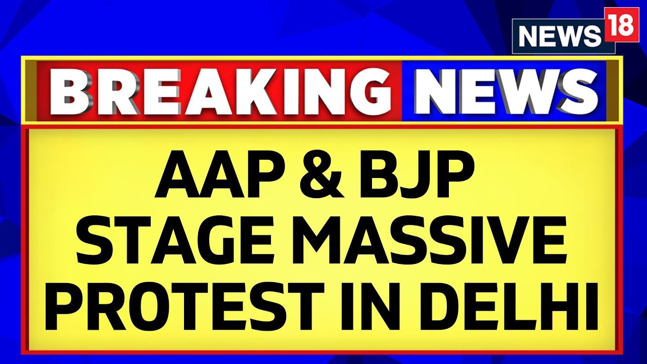 Massive Protest Breaks Out By The AAP Workers Outside The BJP Office | AAP Protests | News18