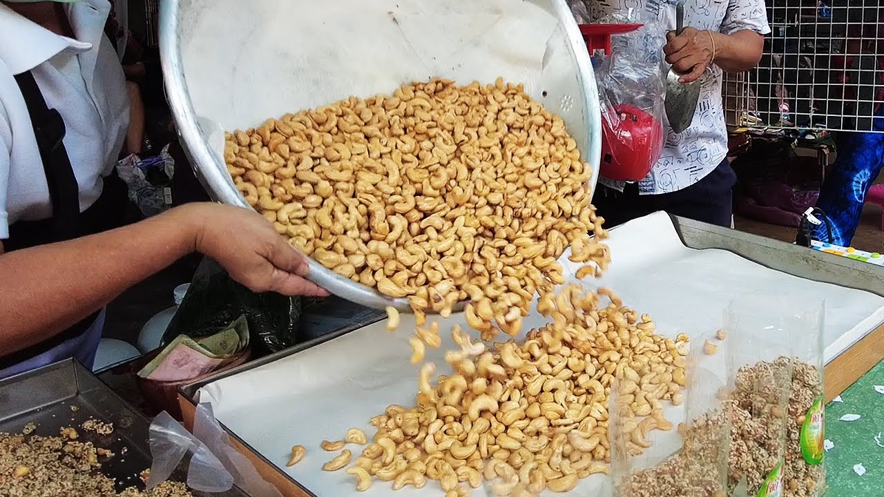 Deep Fried Cashew Nuts with Salt at World Market Street food Thailand | Food News Video