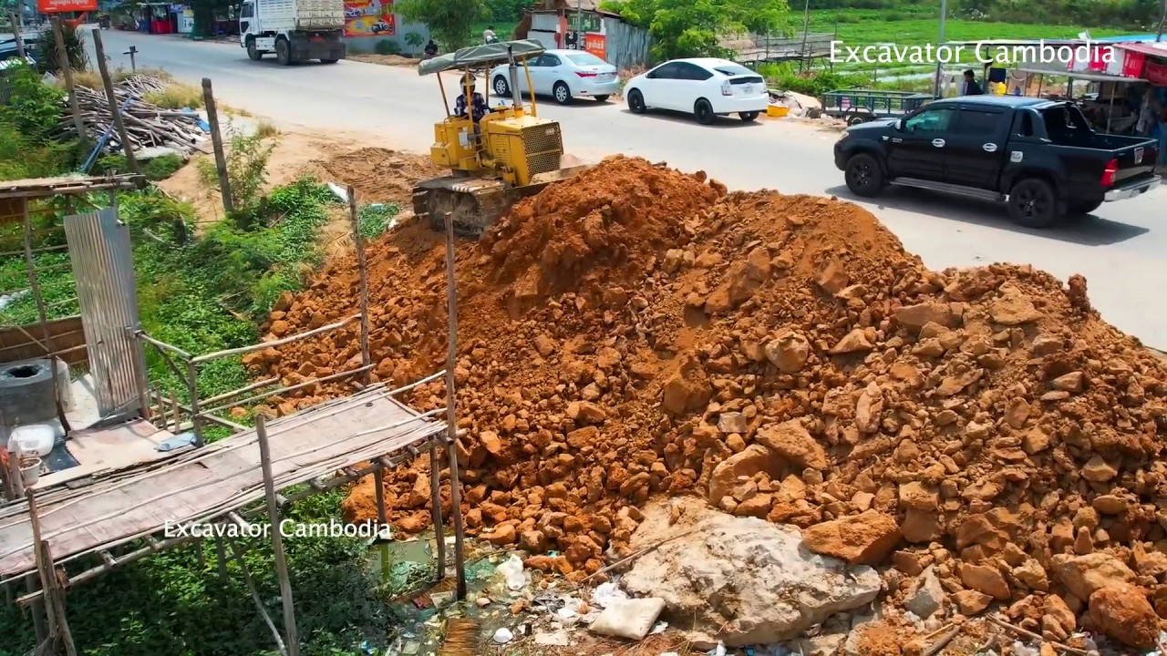 New Project Development City By Dozer D31P & Truck Pushing Soil To Remove Pond To Create A Warehouse
