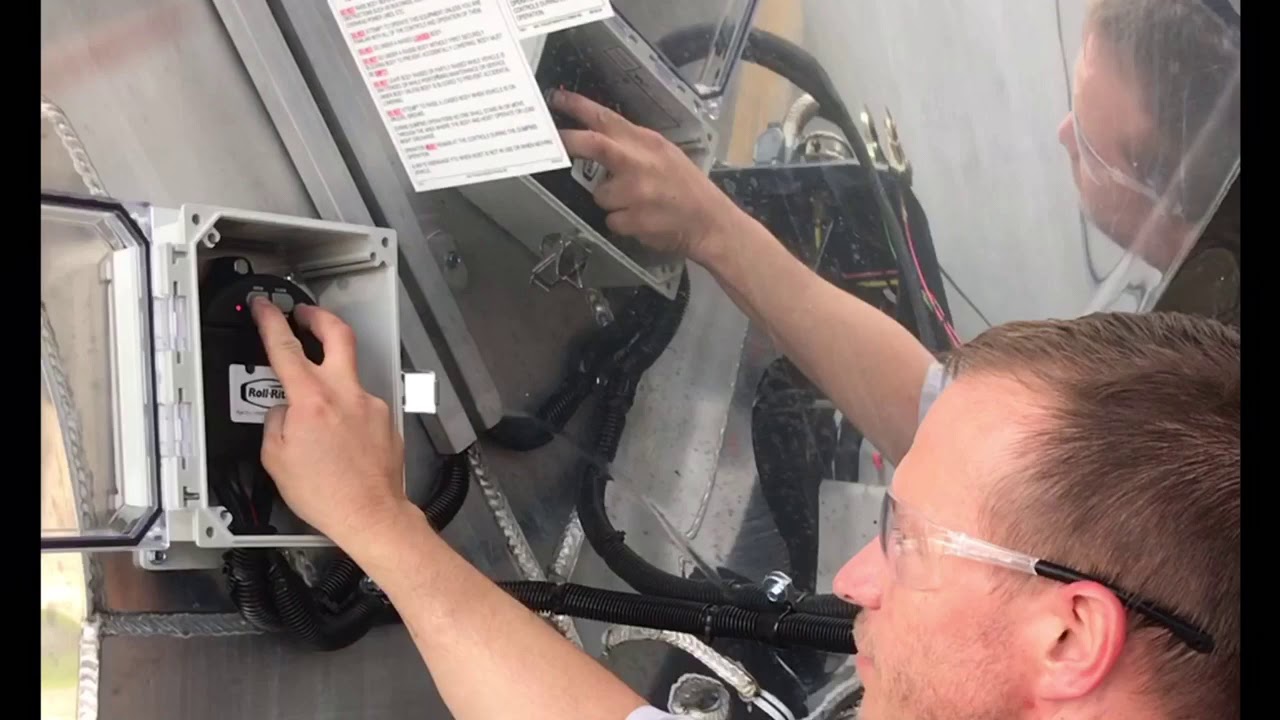 Programming a single remote for a Roll-Rite electric roll tarp system