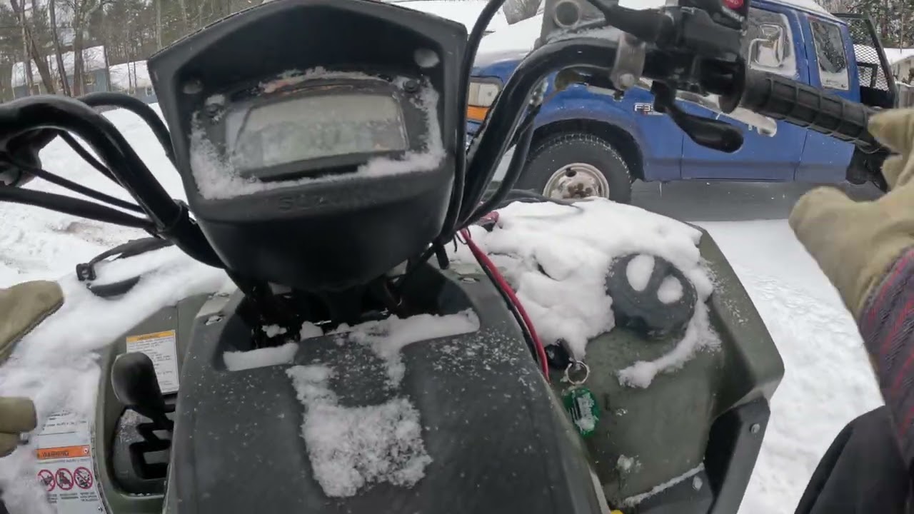 Big snow storm plowing with the 2020 suzuki king quad part 2 