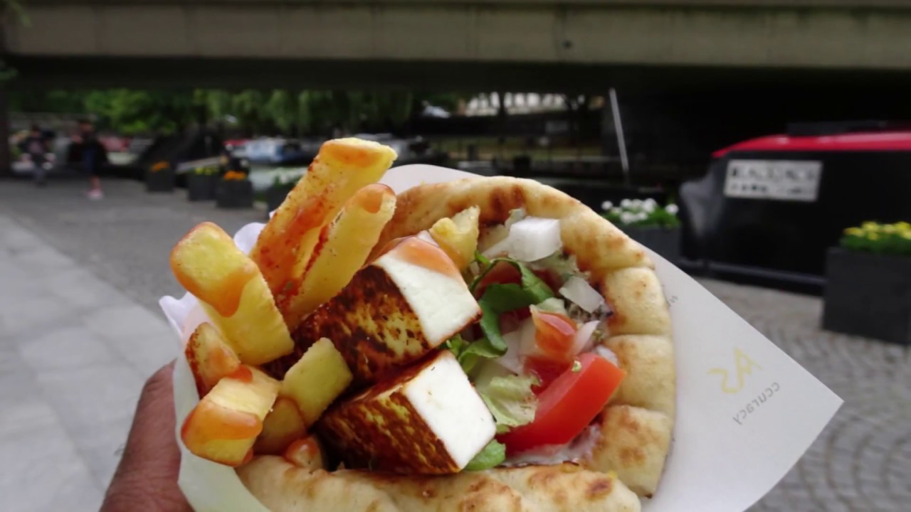 Greek Pitta Bread Wrap with Grilled Manouri Cheese, Tzatziki & Fresh Salad from PITTAGORAS in London