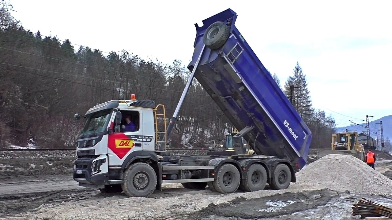 Tridem Volvo FMX 500 and dozer Cat D6R