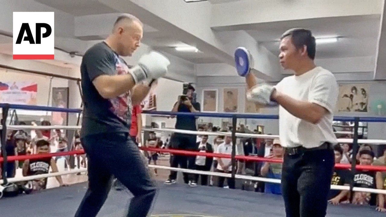Poland President Karol Nawrocki shows off his boxing skills with Manny Pacquiao