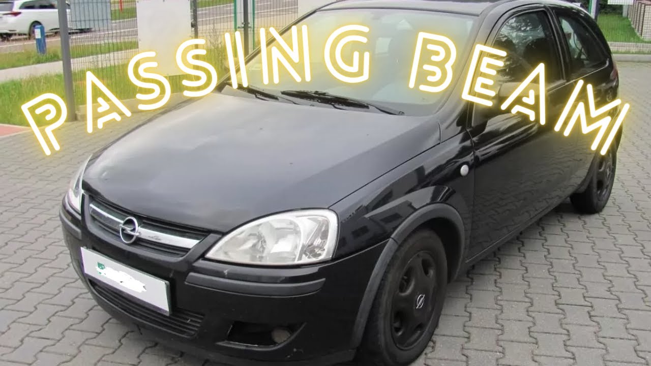 Как заменить лампочку ближнего света на Opel Corsa