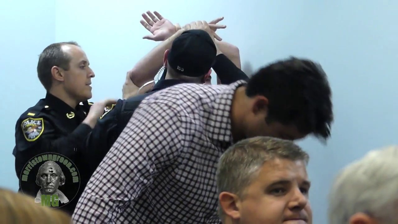 Police remove man from Morris Township meeting