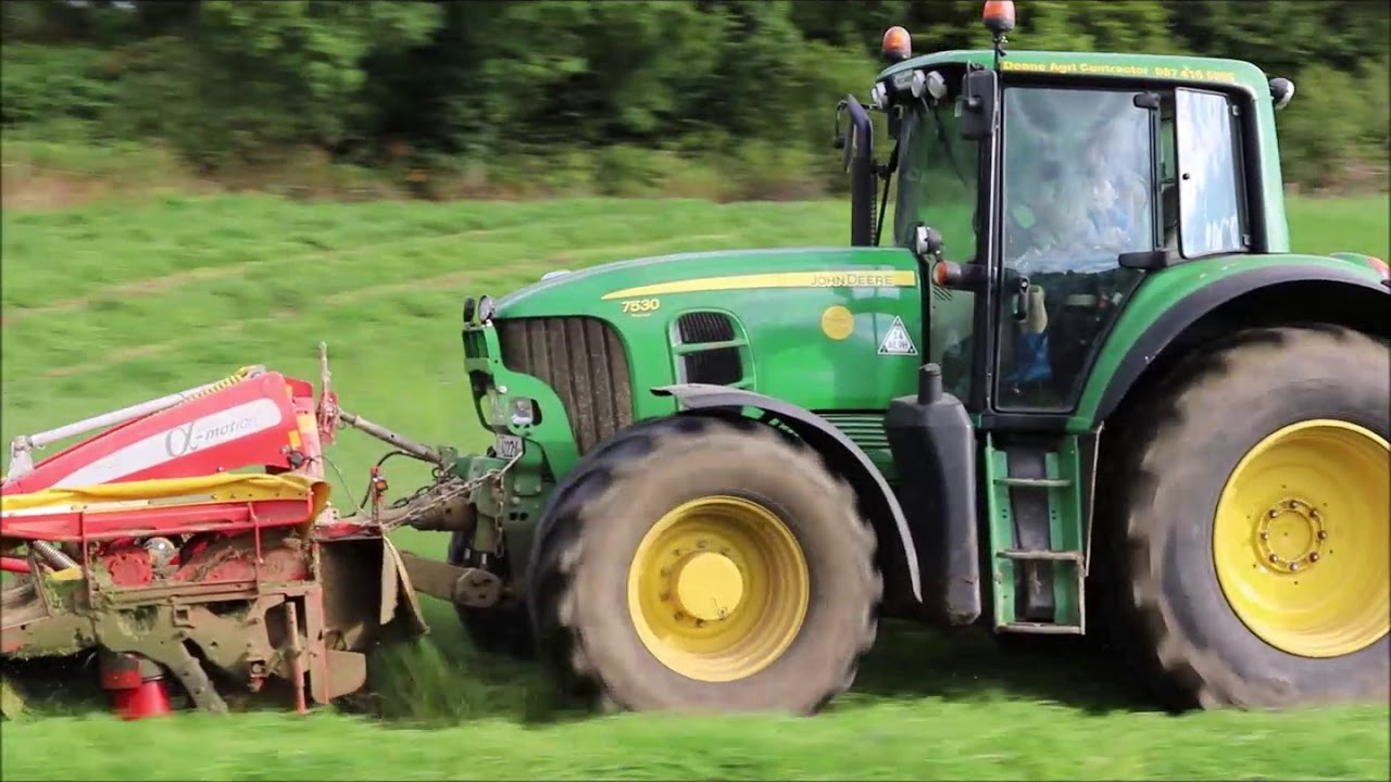 John Deere 7530 with Pottinger frount and back mowers