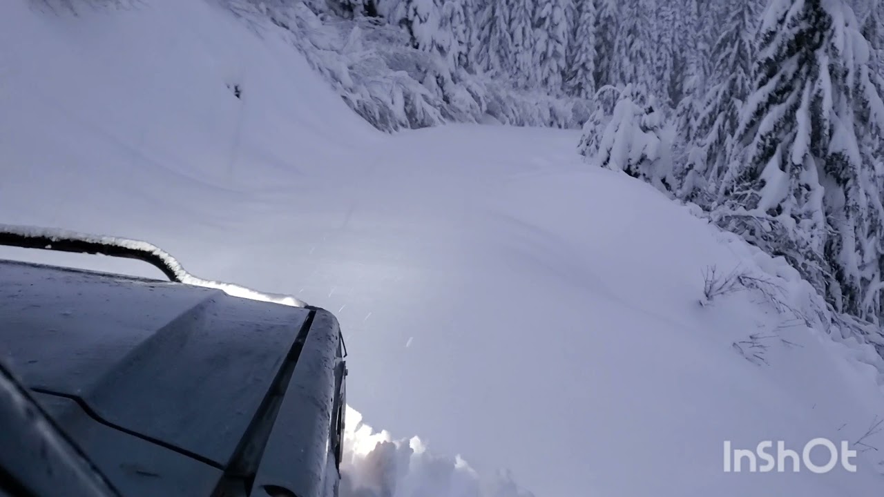Jeep XJ on 40s snow wheeling during a winter storm!