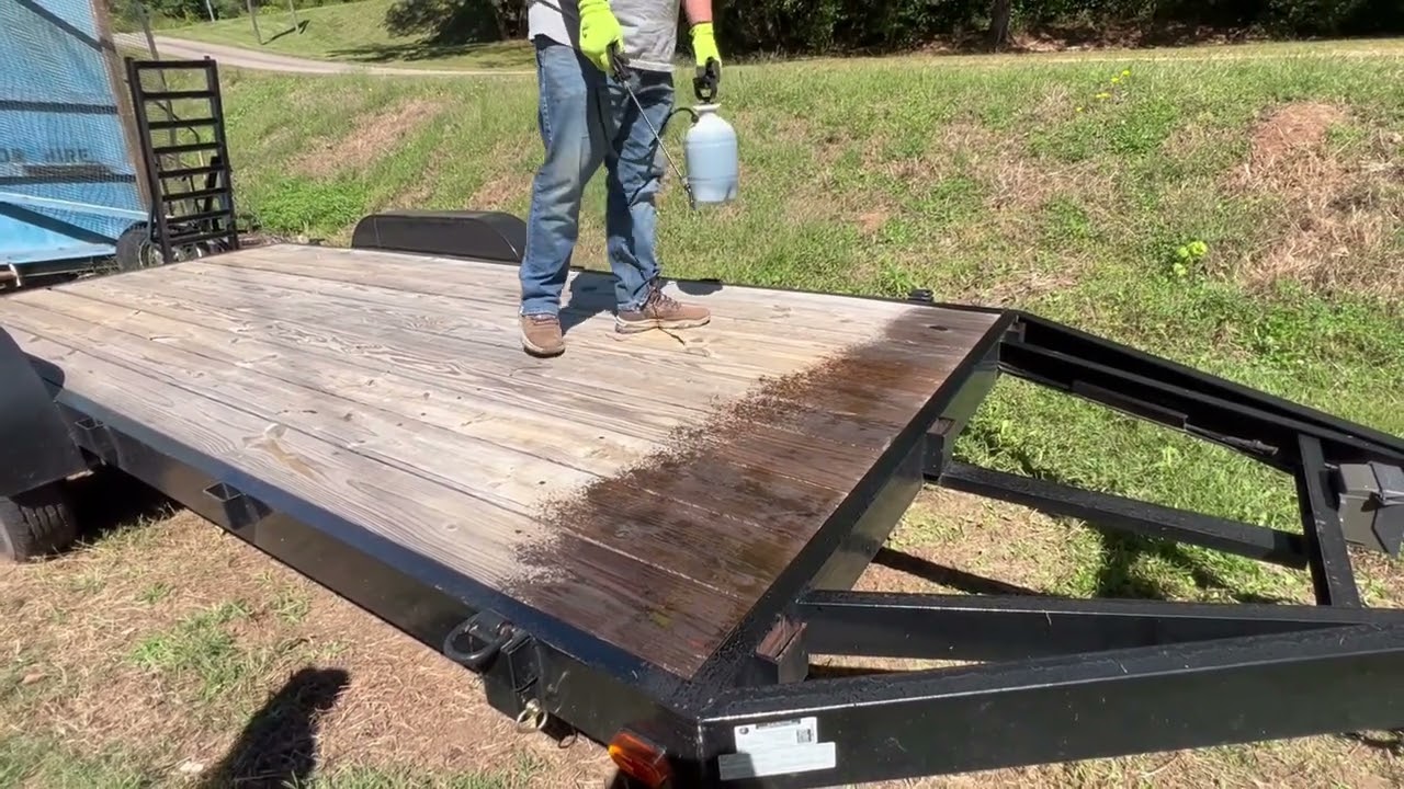 Treating Our Equipment Trailer's Wood Floor With Used Motor Oil & Diesel Fluid
