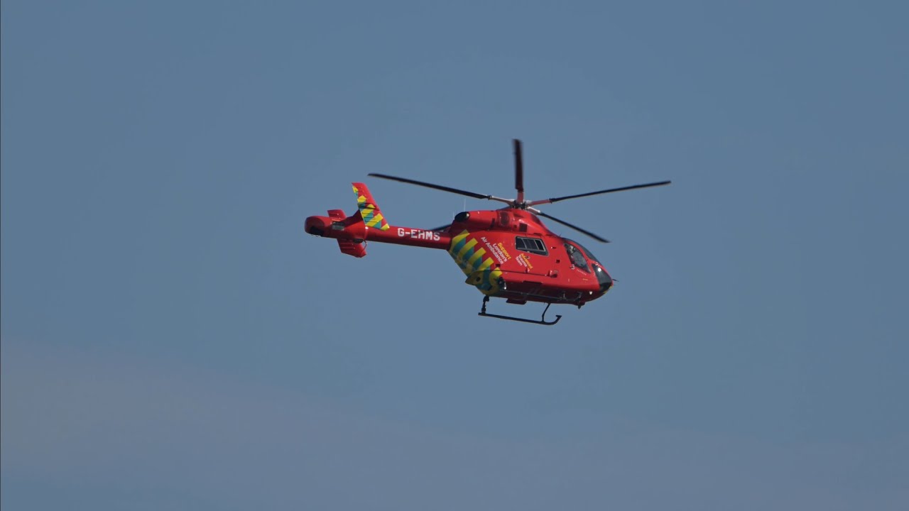 London Air Ambulance MD900 Explorer powering down in the distance to land