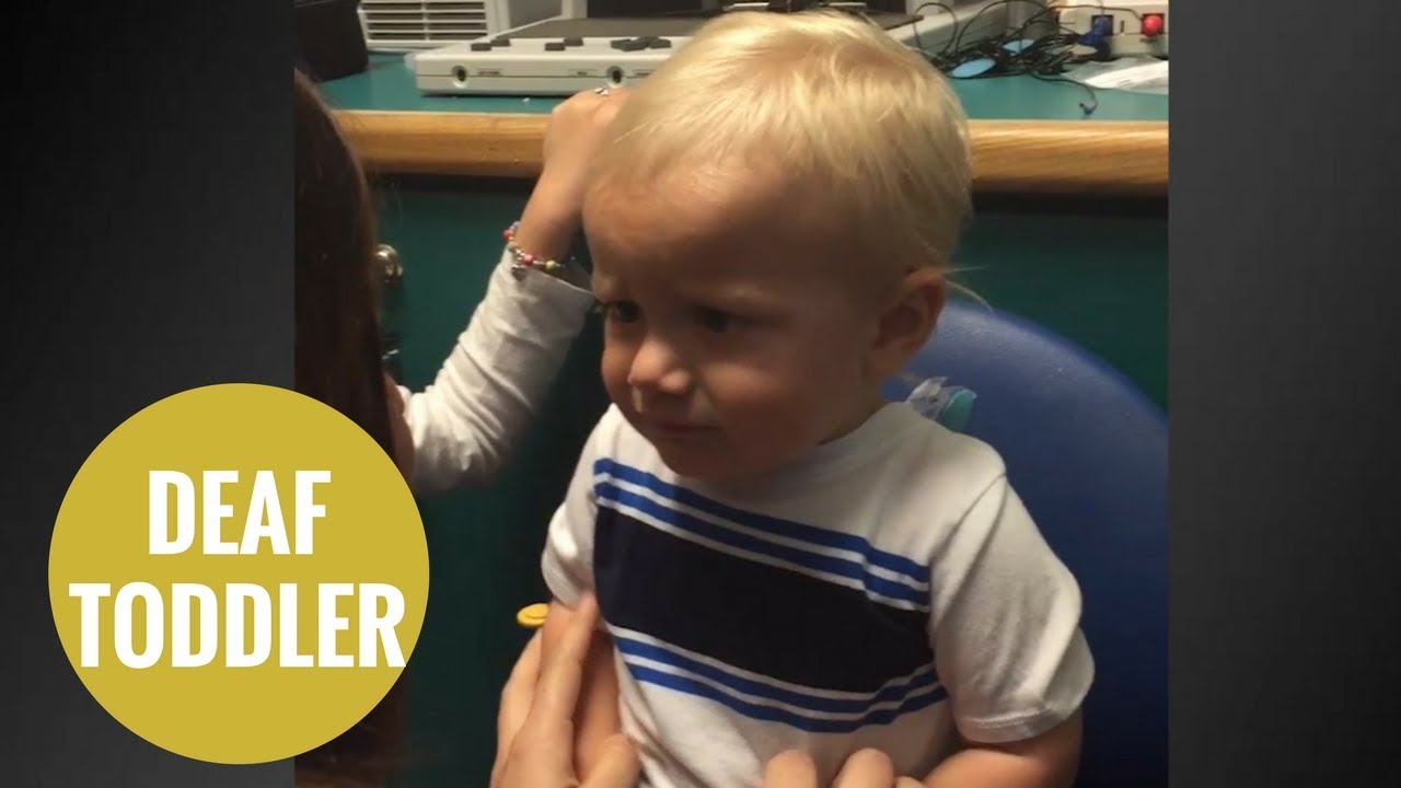 Toddler who was born deaf hears mum say 