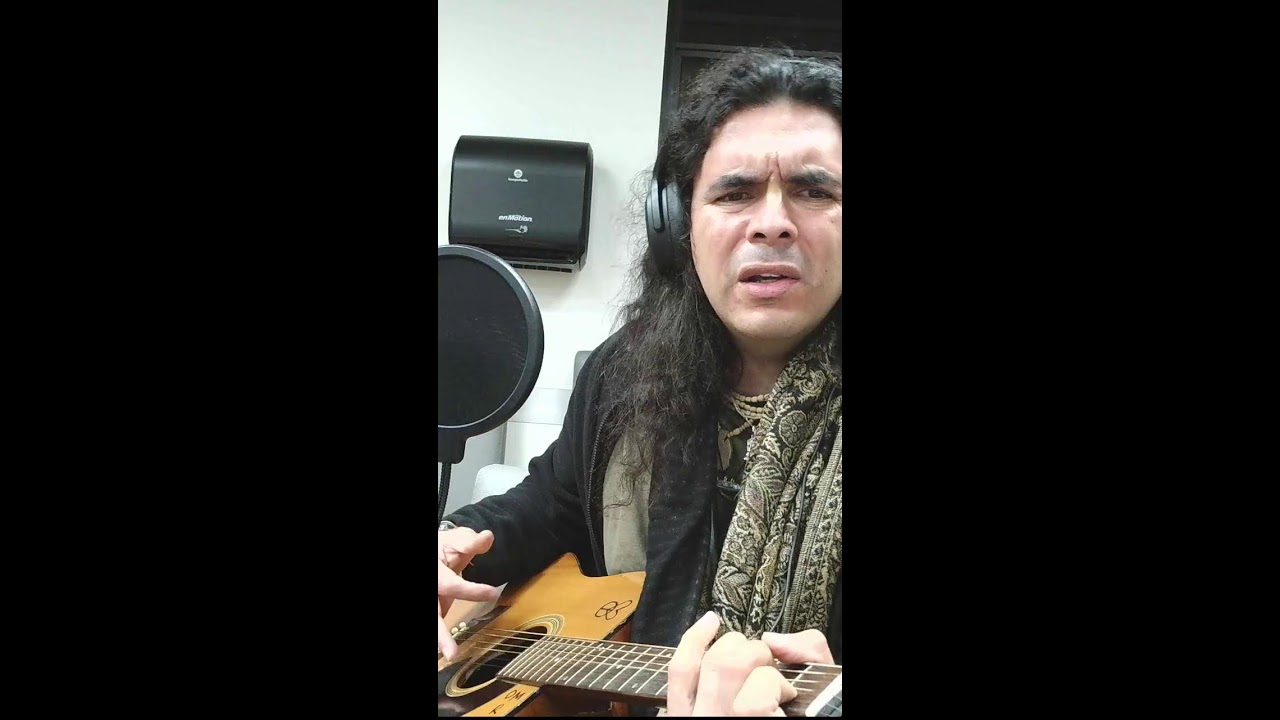 Om Acoustic guitar bansuri and singing  (Portrait)