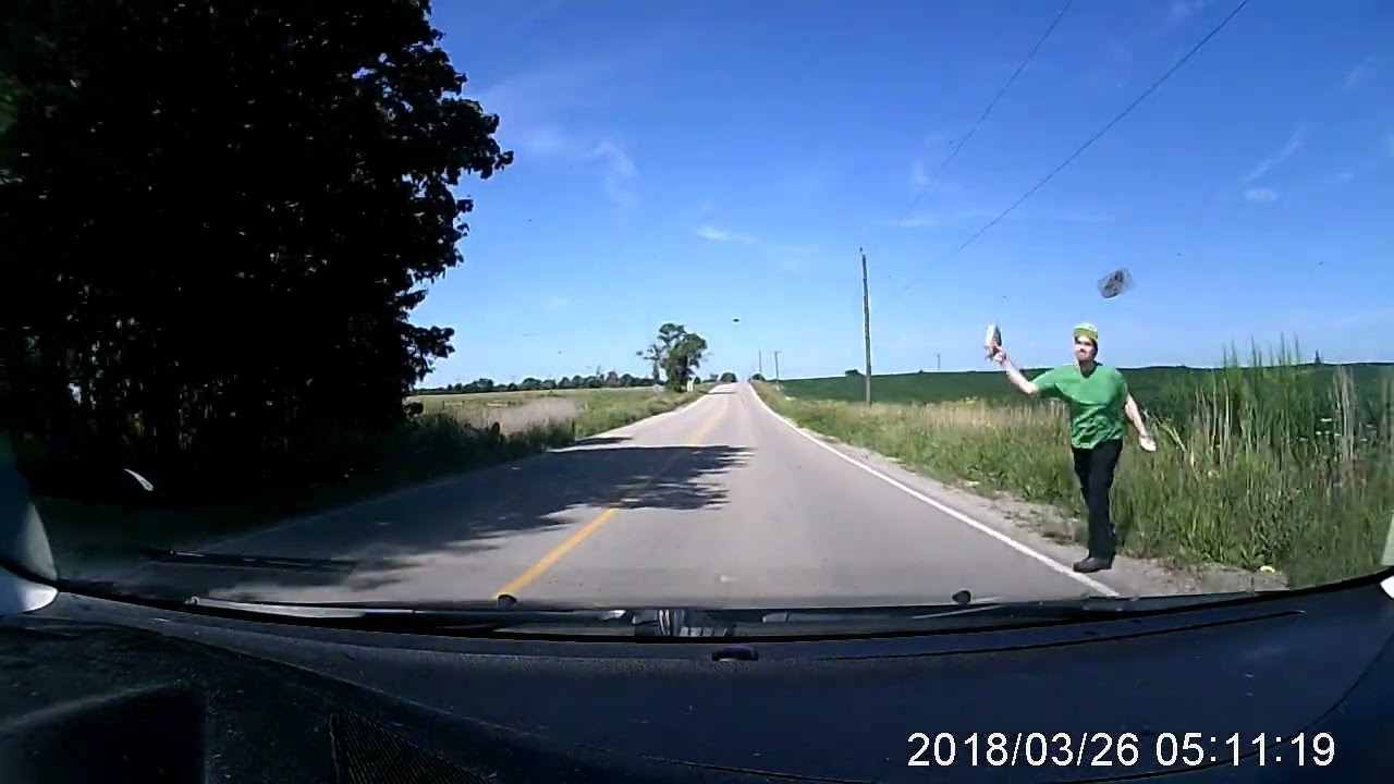 EXTREME ROAD RAGE London Ontario Canada..Farmer gets mad and throws a fish!!