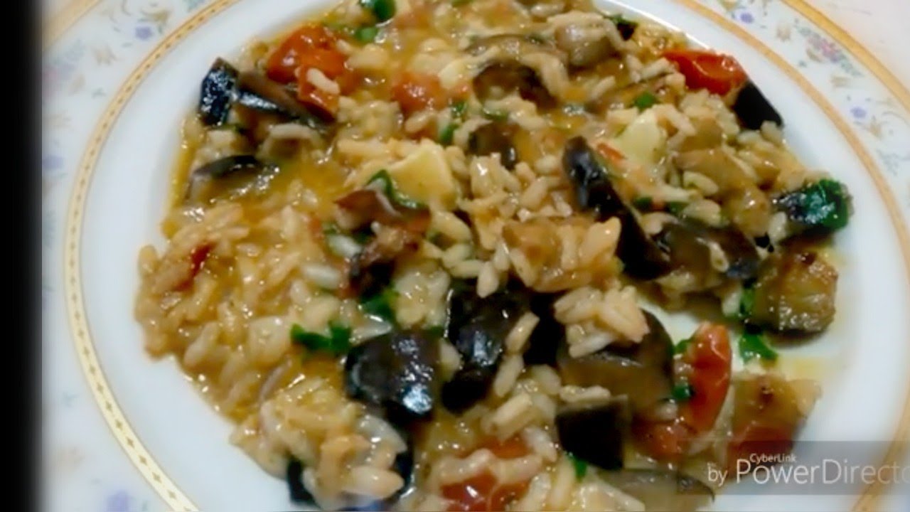 Risotto con melanzane  pomodoro e asiago