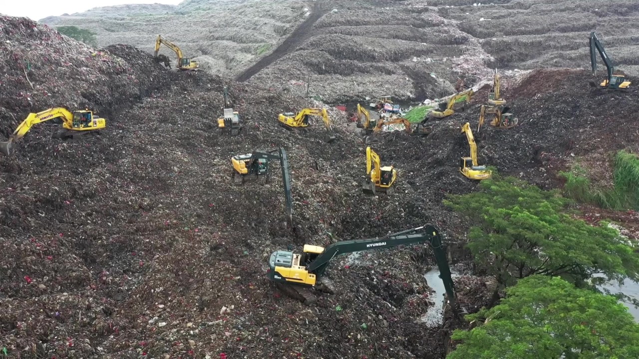 Rescuers in Indonesia search for missing in deadly landfill collapse