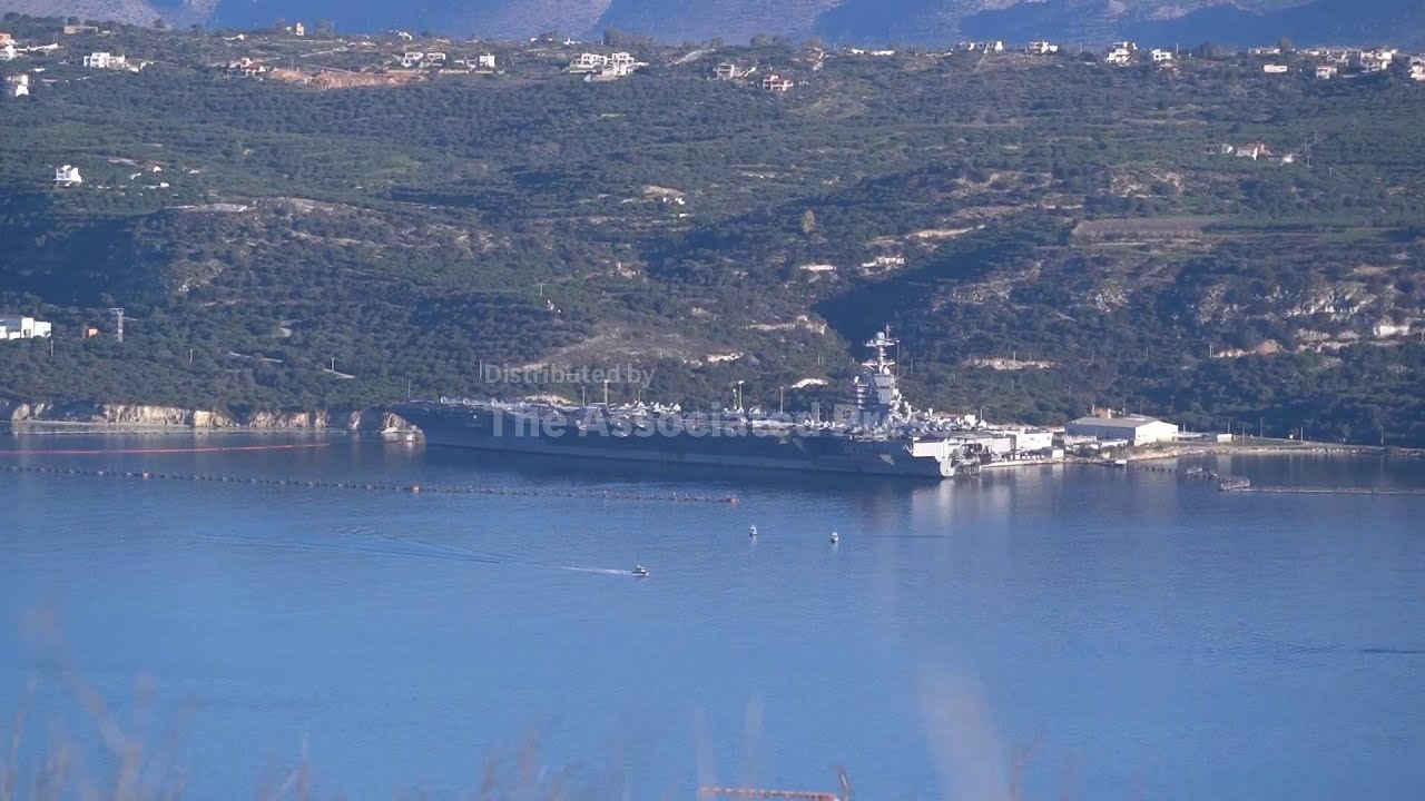 American supercarrier leaves Greek dock for Middle East waters as talks to start