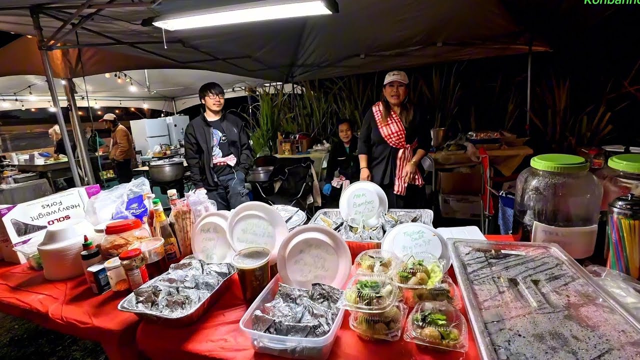 Meeting new friends at Lao Town,  with new booth selling many items