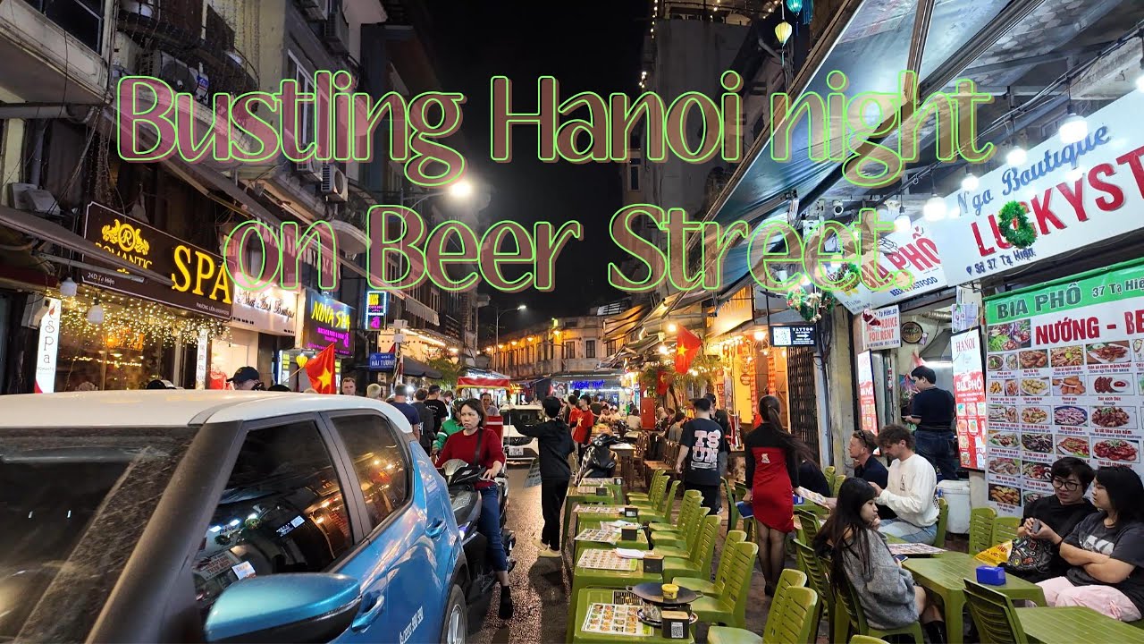 The vibrant energy of a bustling Hanoi night spills onto the famous Beer Street.