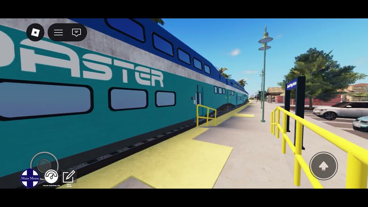 Coaster 2102 pulls a northbound train with amazing k5la at Carlsbad village CA