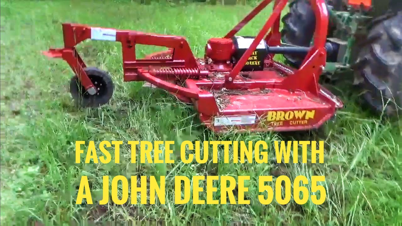New Brown tree cutter in action on a John Deere tractor!
