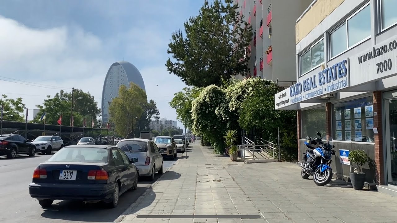 Walking from Bank of Cyprus along Georgiou Griva Digeni street to the sea in Limassol, Cyprus