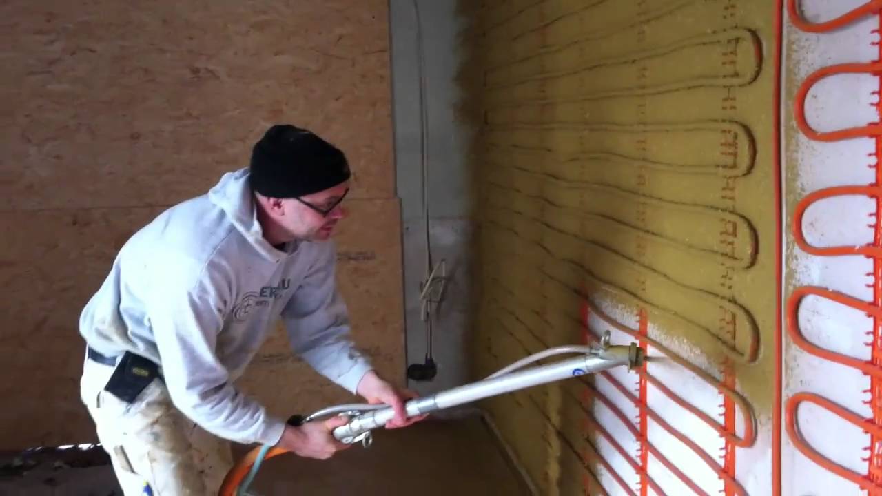 Warmtewand afgewerkt met leemstuc door VERBAU