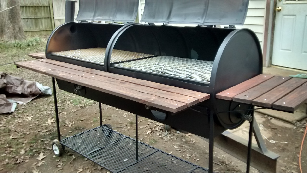 Double barrel bbq pit with steel bottom