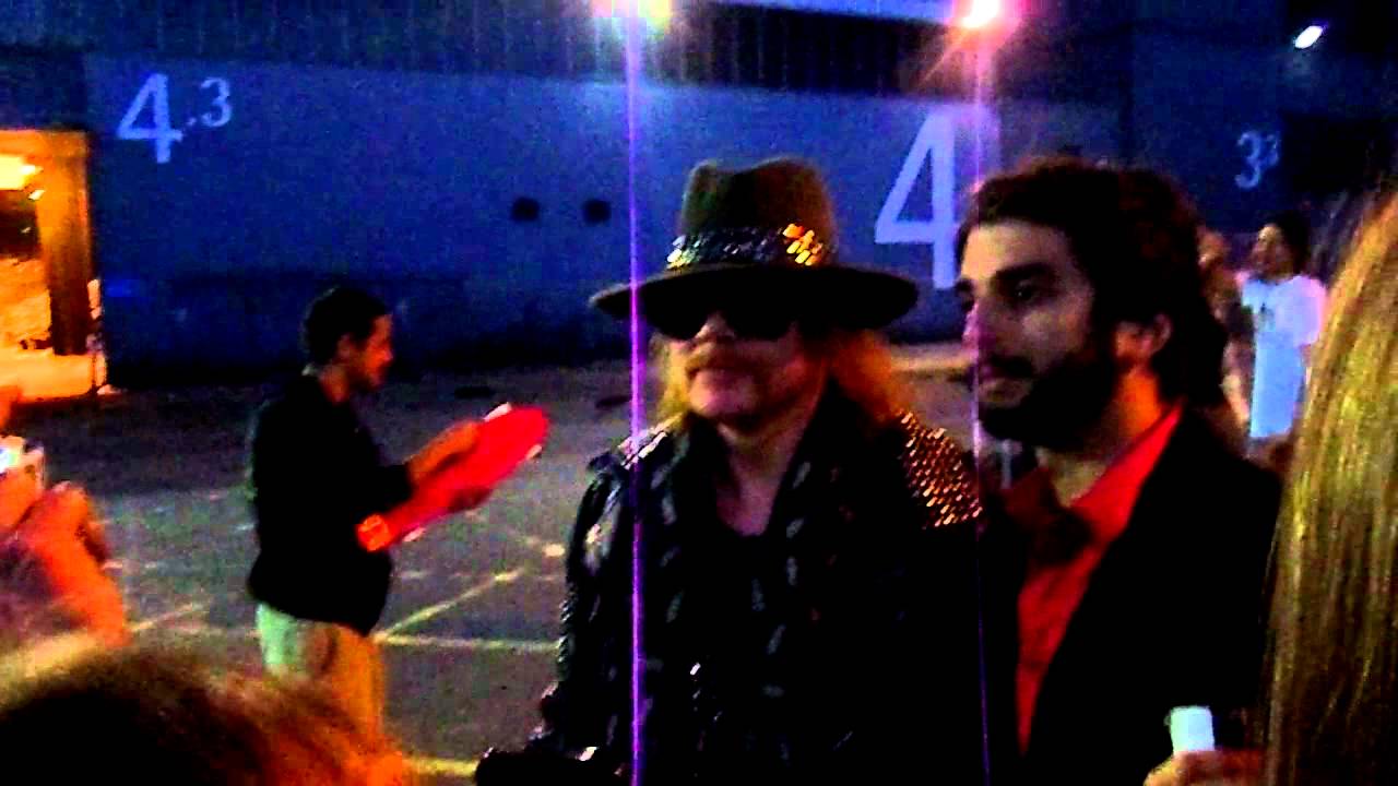 Axl Rose meeting fans outside Glasgow SECC after Guns N' Roses concert.