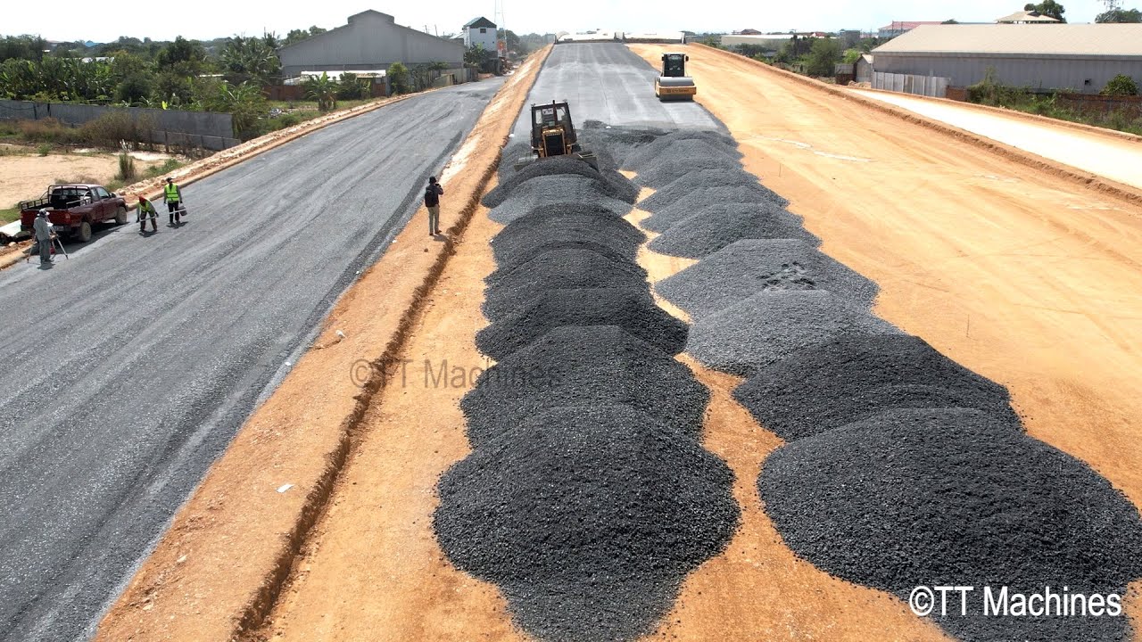Wonderful Capacity D41P KOMATSU Bulldozer Cut And Pushing Gravel On The Ring Road With Dump Truck