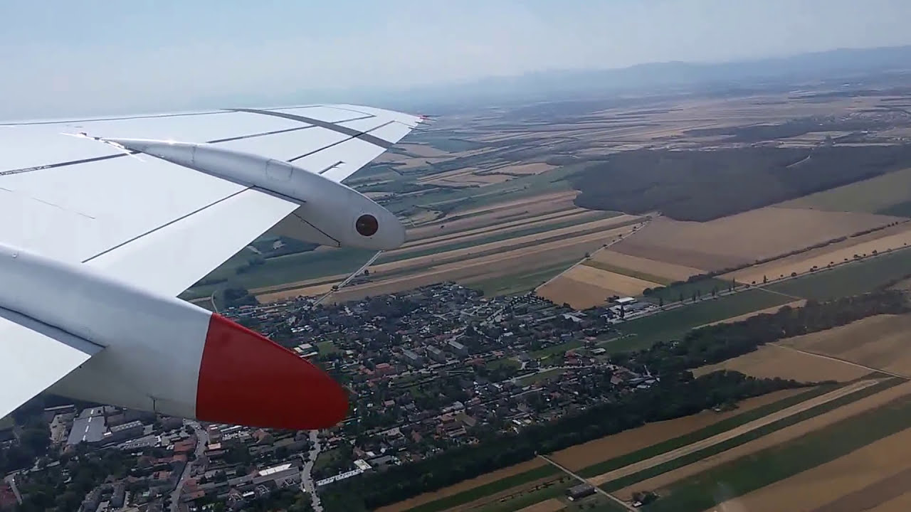 Takeoff at Vienna Airport (Austria) with a Fokker-100 from Austrian Airlines