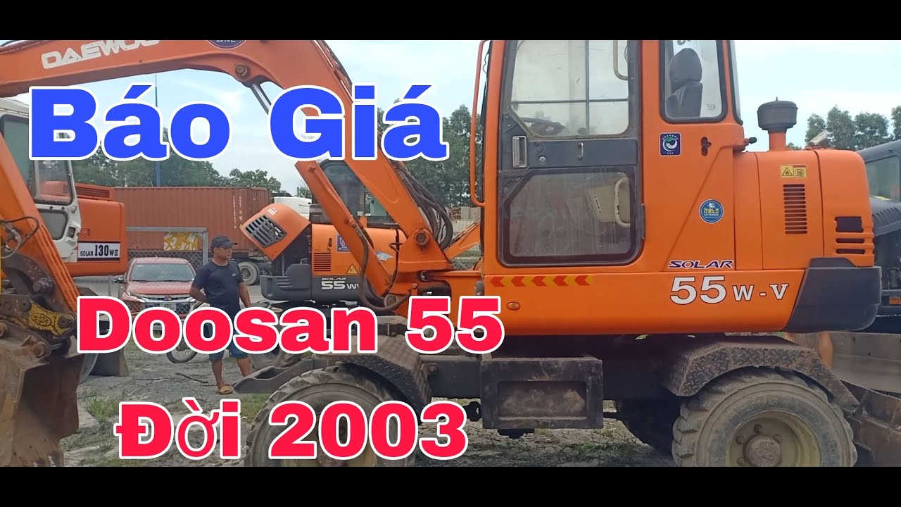 Báo Giá Máy Xúc Bánh Lốp Doosan55 Đời 2003